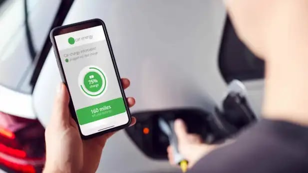 person-charging-vehicle