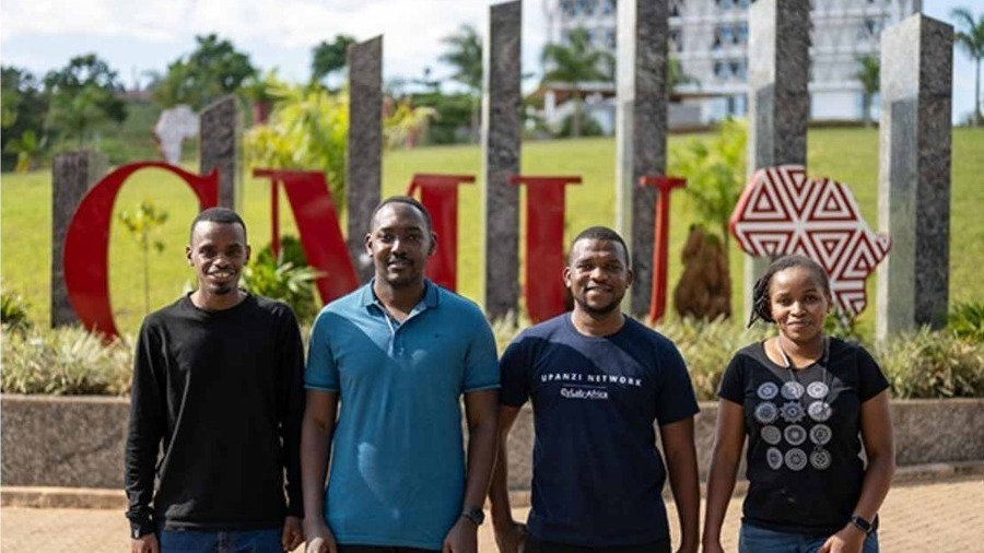 Cylab-Africa Upanzi Network team photo in front of CMU logo