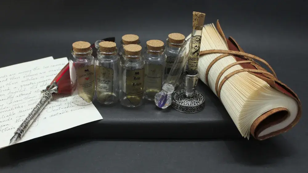 Clear glass miniature bottles on black table