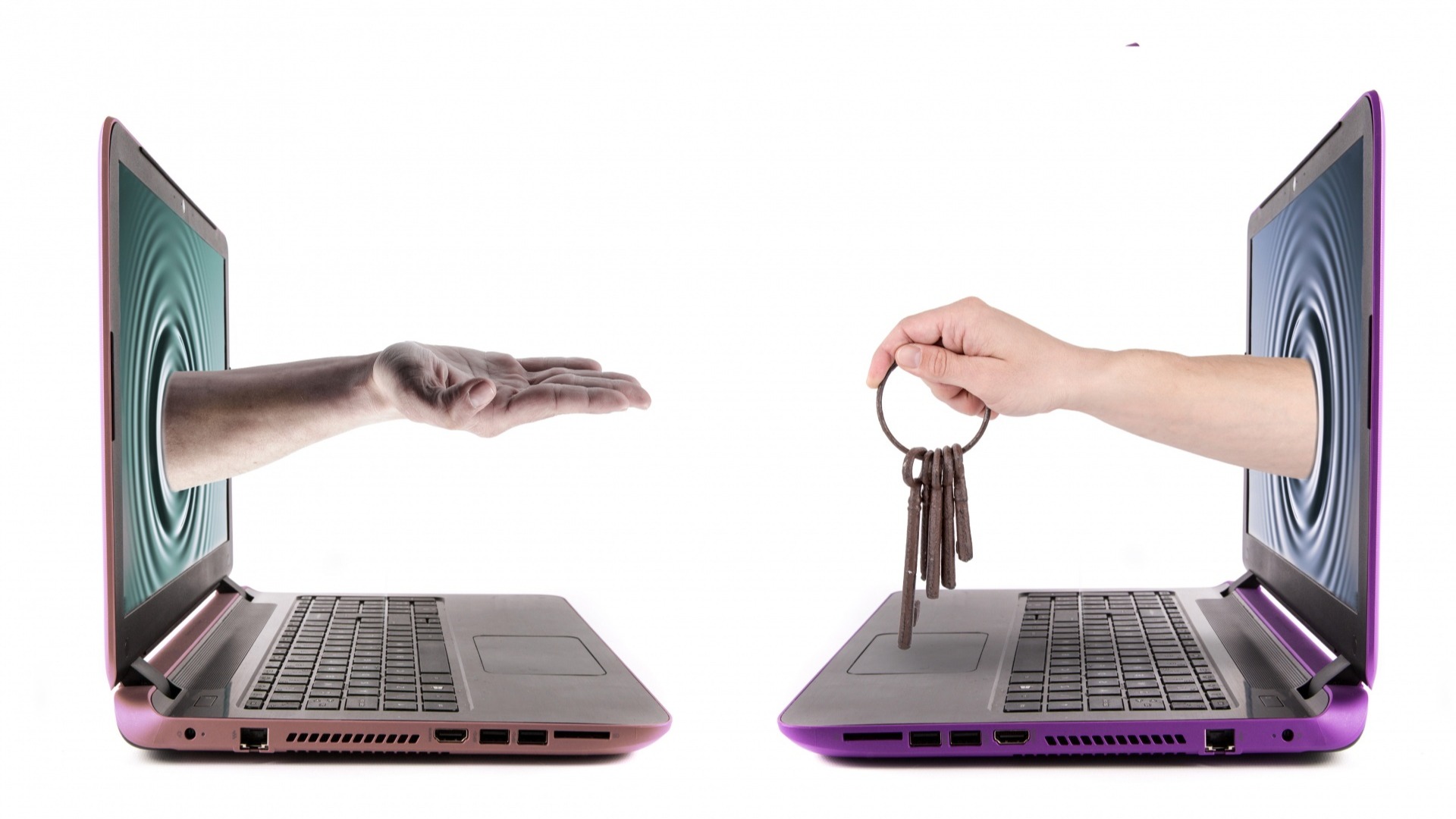 Hand holding old keys