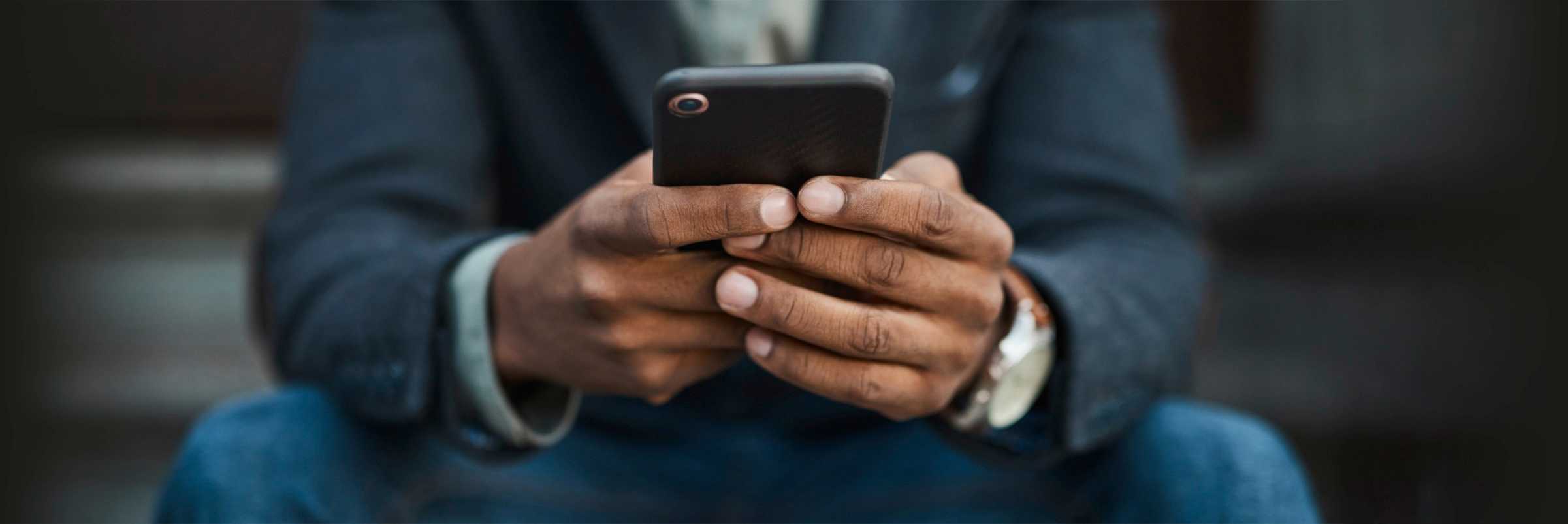 Close up of man using a smartphone